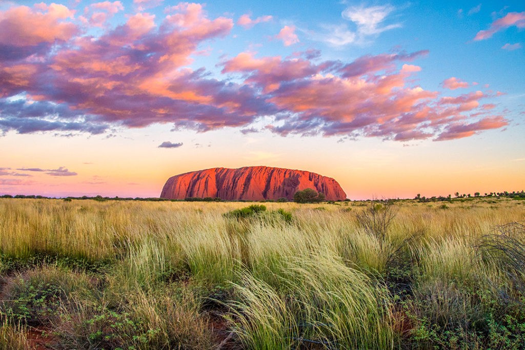 Uluru at sunset â€“ one of our top 100 travel experiences