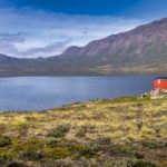 trekking the arctic circle trail lead image with hut and lake